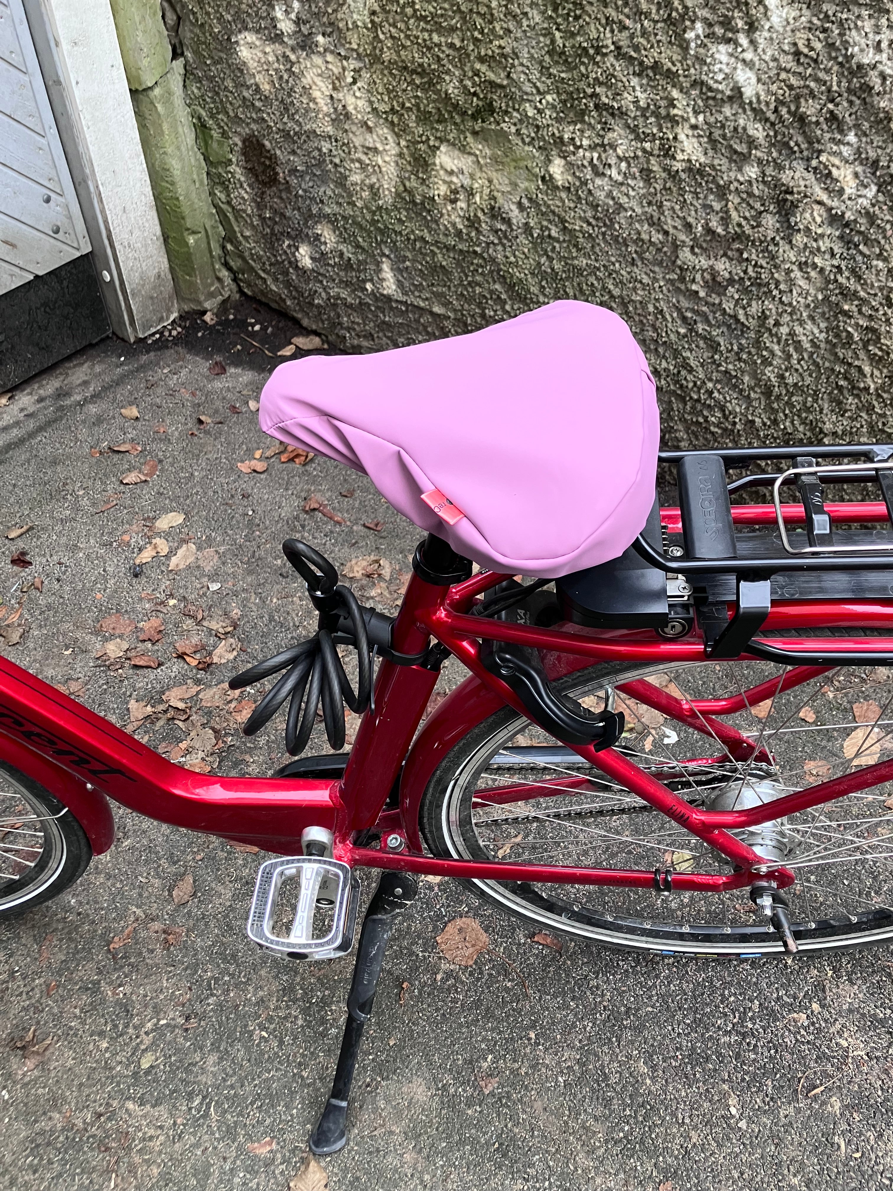 reusable bicycle seat cover: upcycled waterproof & durable (pink/purple)