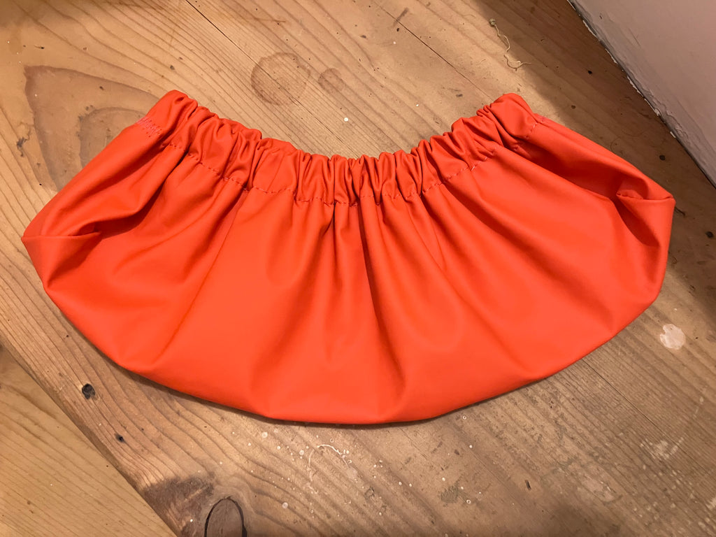 The Shoe Cover · orange